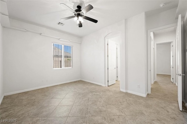 spare room with ceiling fan