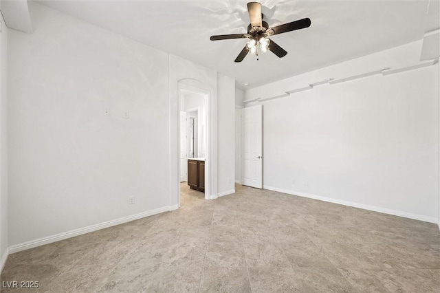 unfurnished room featuring ceiling fan