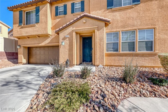 view of front of property with a garage