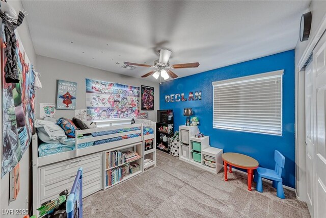 interior space featuring a closet and ceiling fan