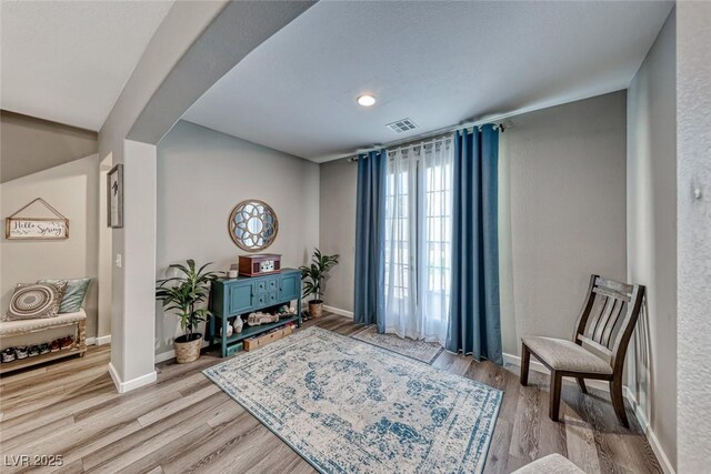 living area with light wood-type flooring