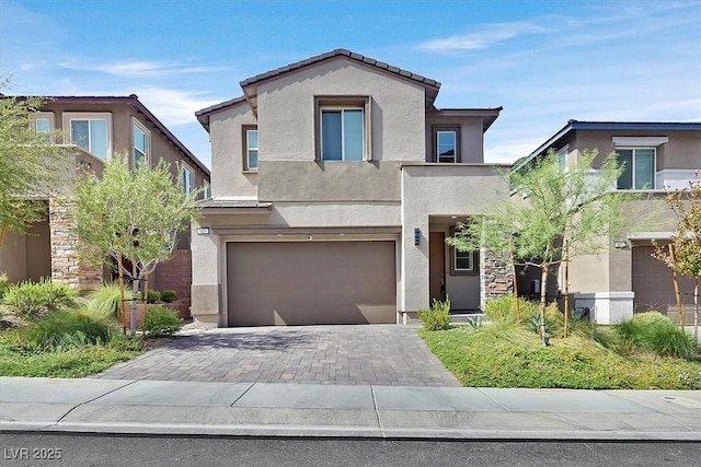 view of front of home with a garage