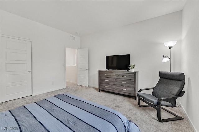 bedroom with light carpet