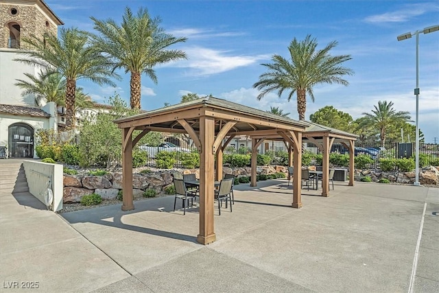 view of property's community featuring a patio and a gazebo