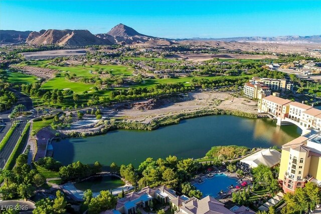 bird's eye view with a water and mountain view