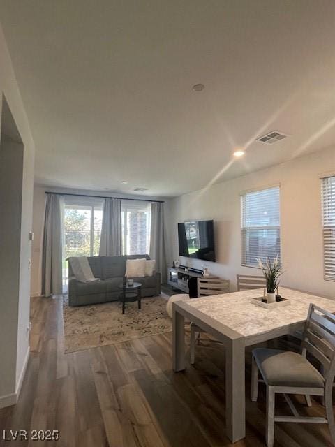 living room with dark hardwood / wood-style floors