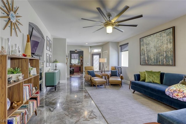 living room with ceiling fan