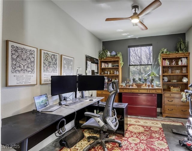 office space with ceiling fan