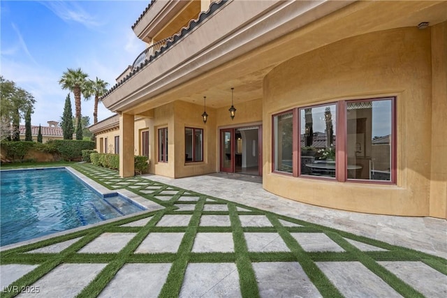 view of pool featuring a patio and a fenced in pool