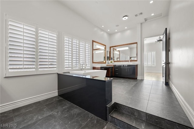 bathroom featuring recessed lighting, visible vents, vanity, and baseboards