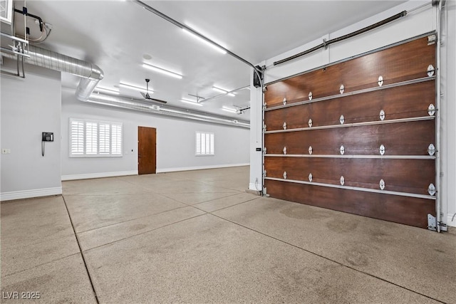 garage featuring visible vents and baseboards