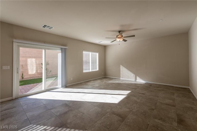 empty room featuring ceiling fan