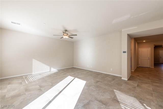 spare room with ceiling fan