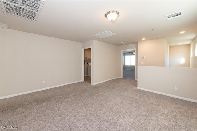 unfurnished room featuring carpet flooring