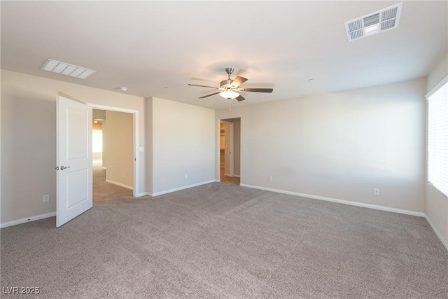 carpeted empty room with ceiling fan