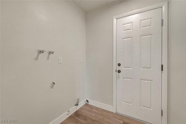 clothes washing area featuring washer hookup and hookup for a gas dryer