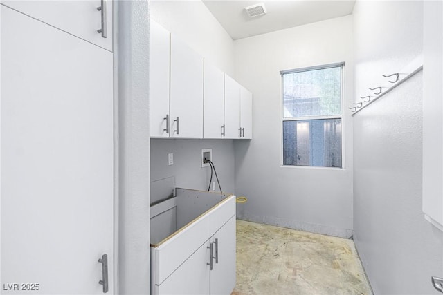 washroom with cabinets