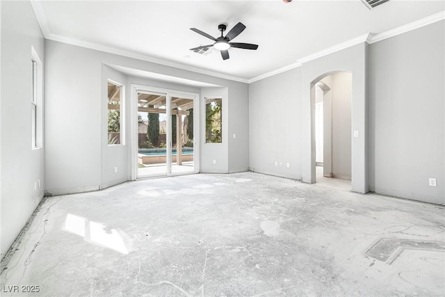 unfurnished room featuring ceiling fan and crown molding