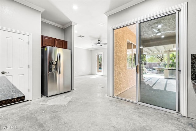 kitchen featuring ornamental molding, ceiling fan, and stainless steel fridge