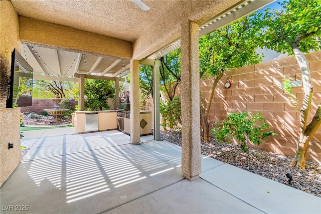 view of patio featuring ceiling fan and area for grilling