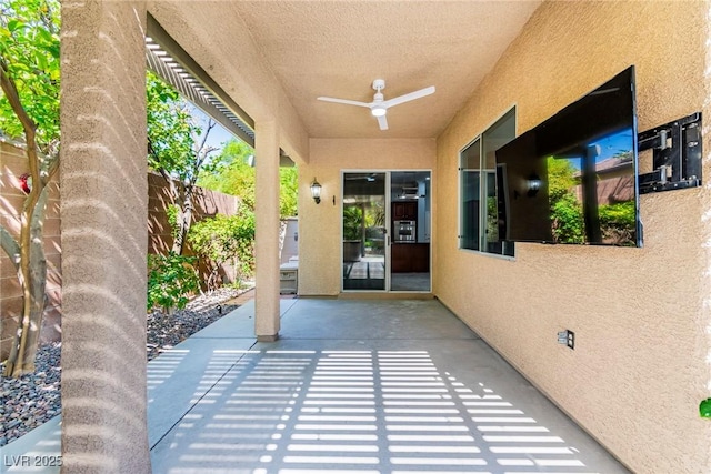 view of patio with ceiling fan