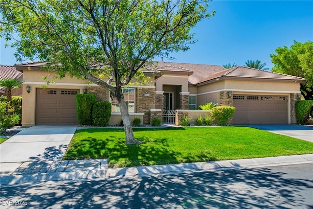 view of front of house with a front yard and a garage