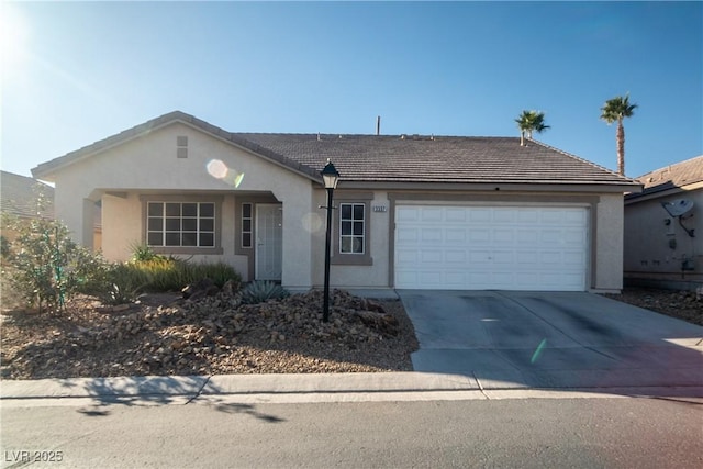 single story home featuring a garage