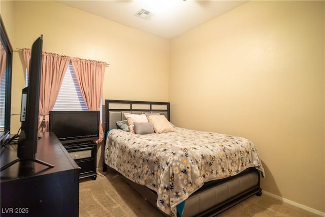 carpeted bedroom featuring lofted ceiling