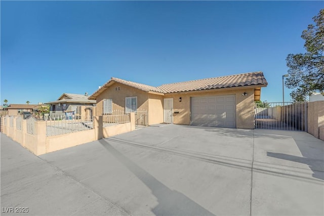 view of front of home featuring a garage