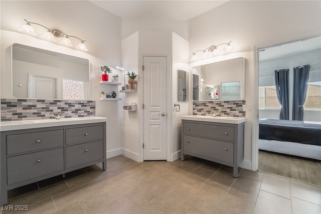 bathroom featuring backsplash and vanity