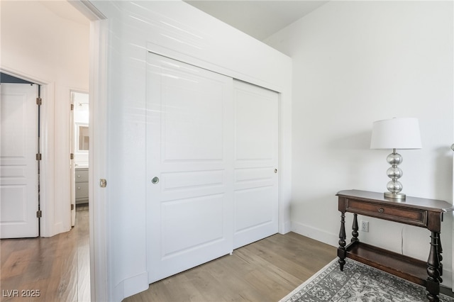 interior space featuring a closet and hardwood / wood-style floors