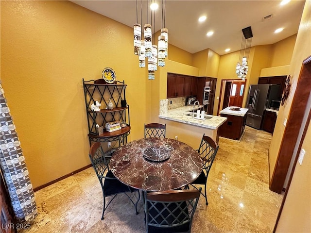 dining space featuring sink