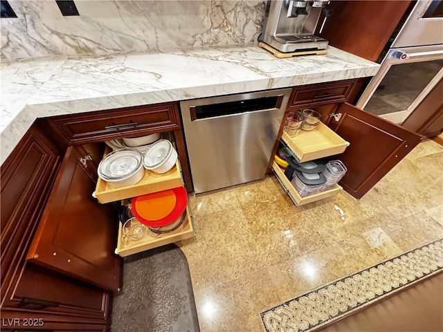 room details featuring light stone countertops, stainless steel dishwasher, and backsplash