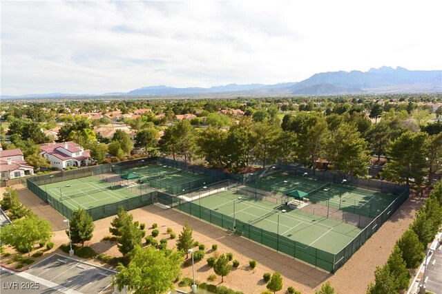 birds eye view of property featuring a mountain view