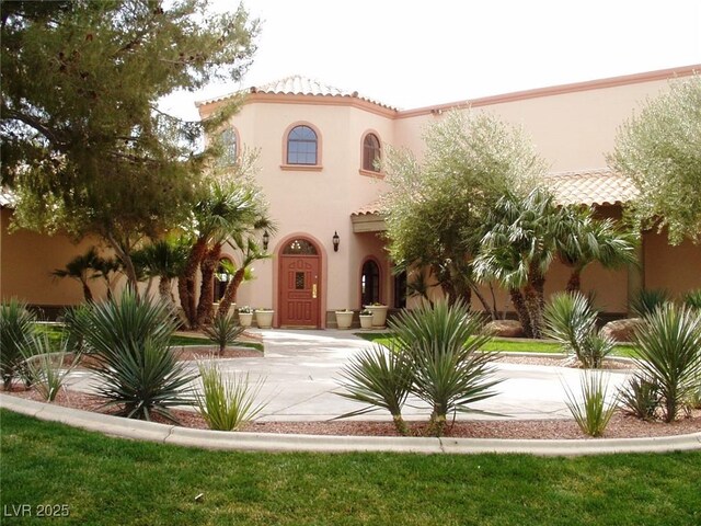 view of mediterranean / spanish house