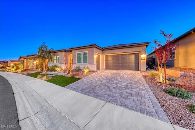 view of front of property featuring a garage