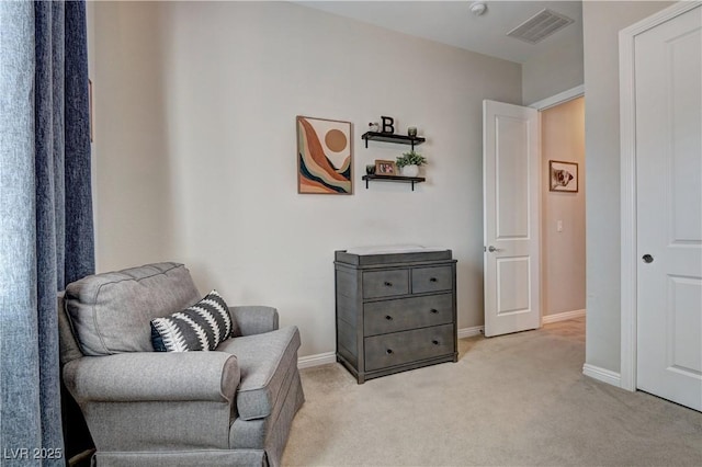 sitting room with light carpet