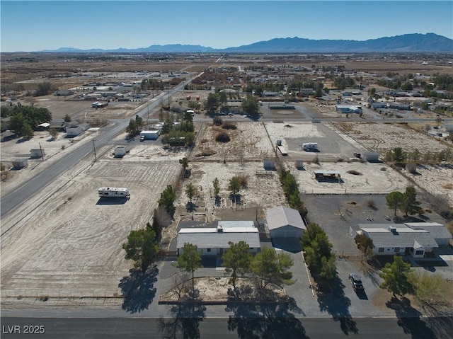 drone / aerial view featuring a mountain view