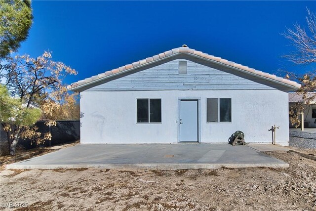 rear view of house with a patio area