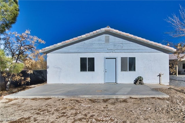 back of house featuring a patio