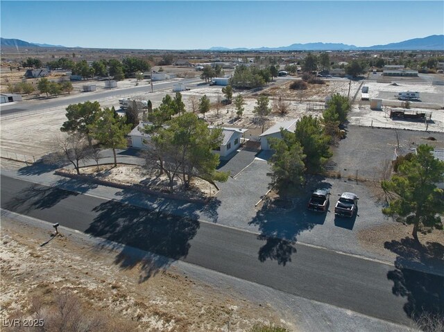 bird's eye view with a mountain view