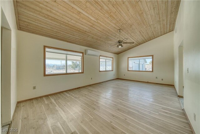 spare room with wooden ceiling, vaulted ceiling, light hardwood / wood-style floors, ceiling fan, and a wall mounted air conditioner