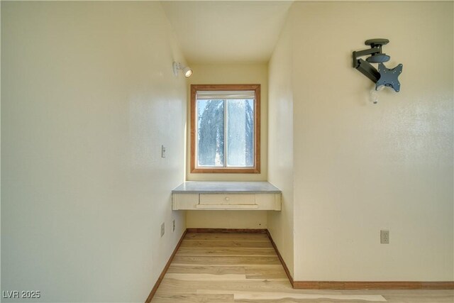 hallway featuring light wood-type flooring