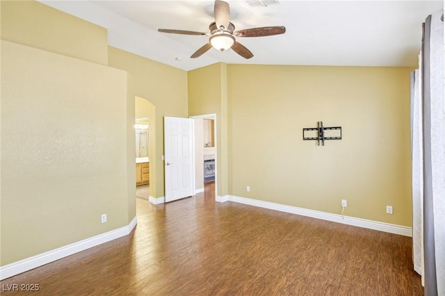 spare room with ceiling fan and hardwood / wood-style floors