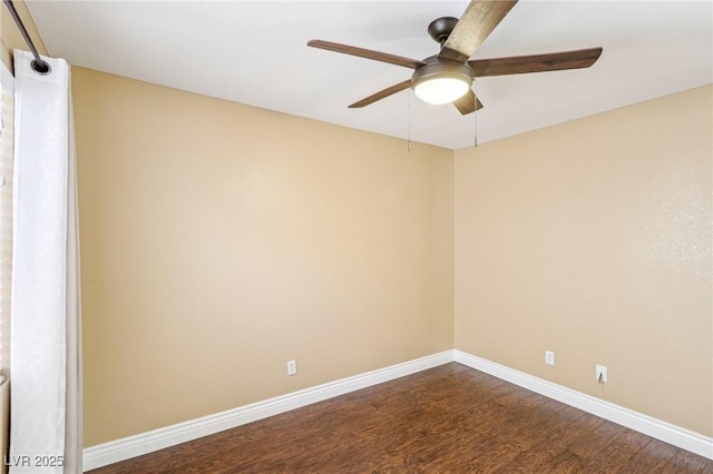 spare room featuring ceiling fan and wood-type flooring