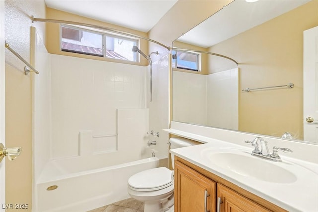 full bathroom featuring shower / washtub combination, tile patterned floors, vanity, and toilet