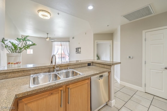 kitchen with sink, light tile patterned floors, ceiling fan, and dishwasher