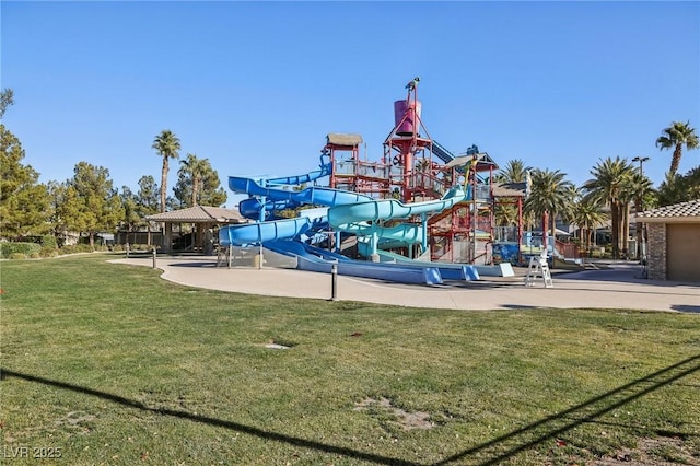 view of play area with a gazebo and a lawn