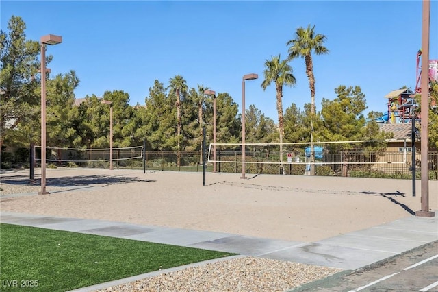 view of property's community featuring volleyball court