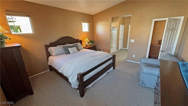 carpeted bedroom with multiple windows and vaulted ceiling